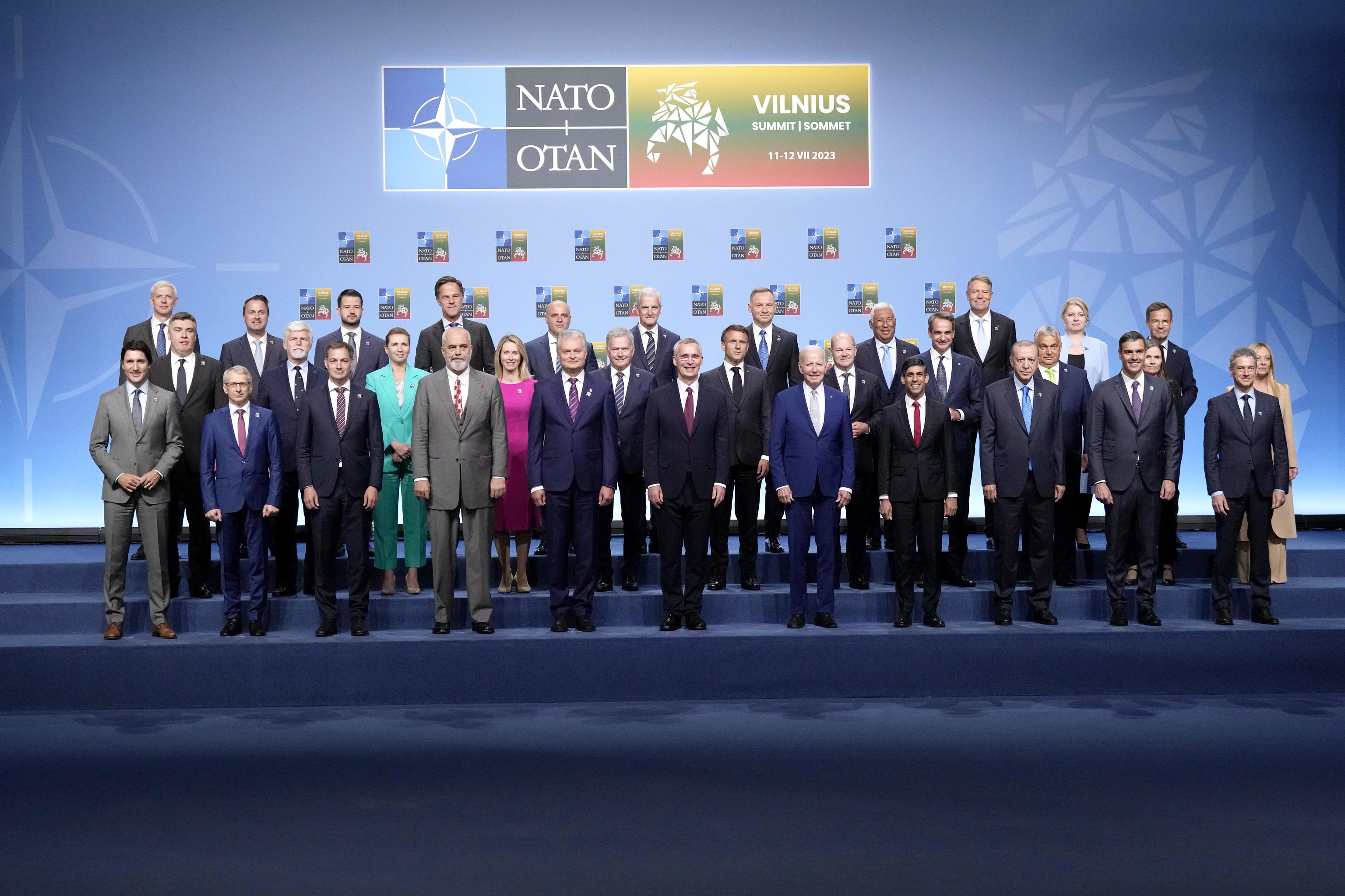 NATO heads of state and government pose during a NATO summit in Vilnius.