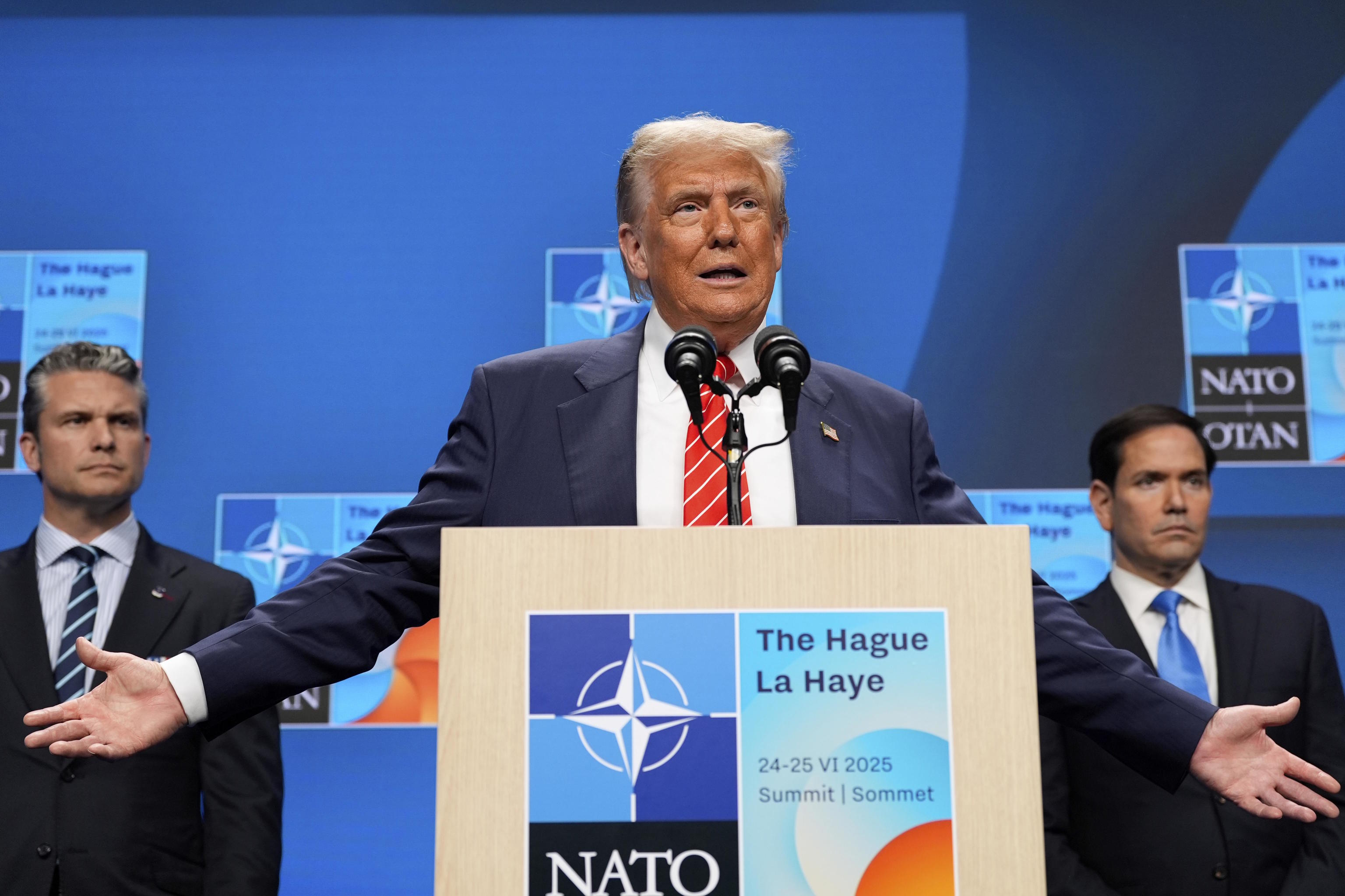 Donald Trump during a press conference with Pete Hegseth and Marco Rubio.
