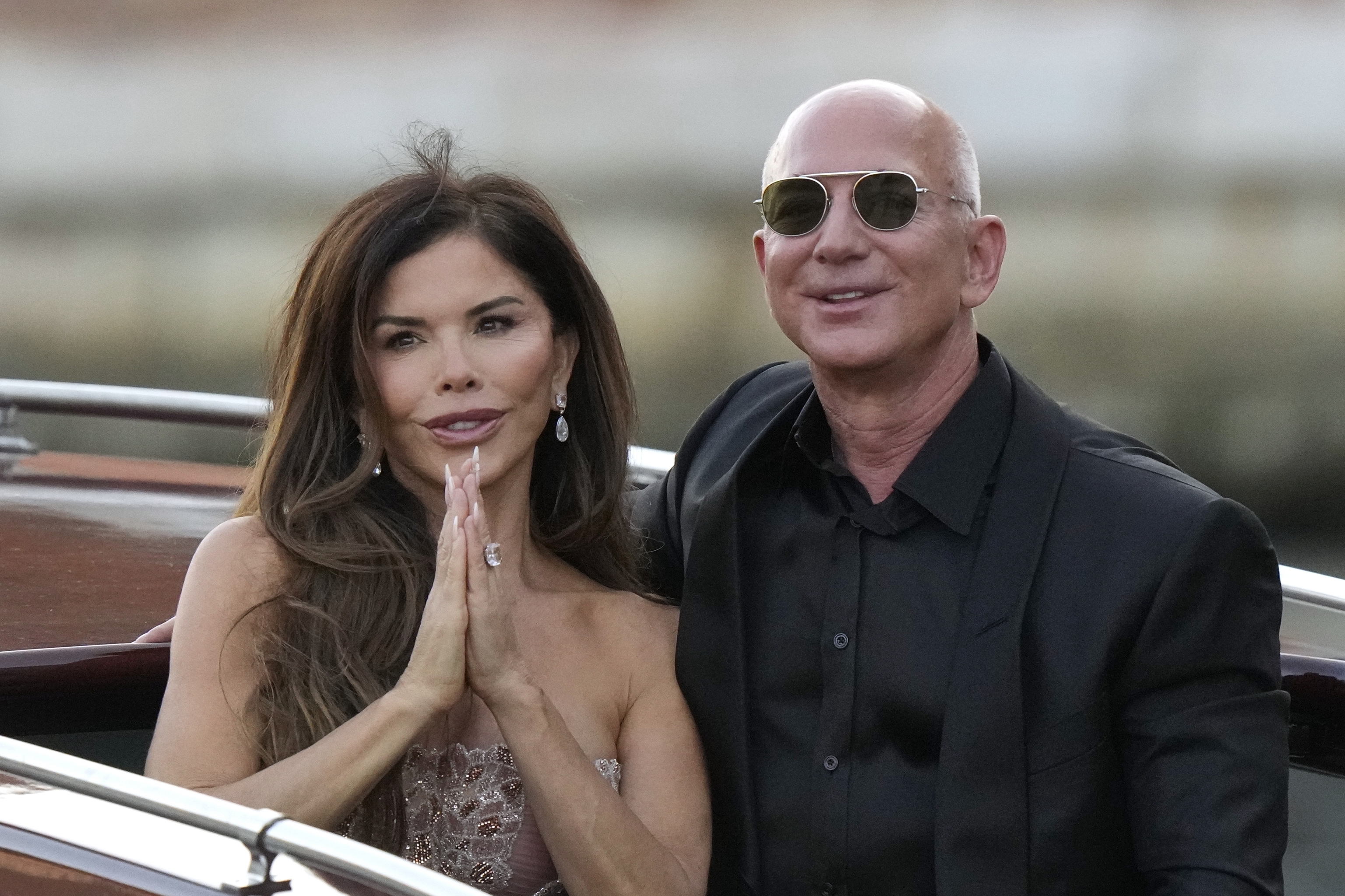 Lauren Sanchez Bezos, left, and Jeff Bezos.