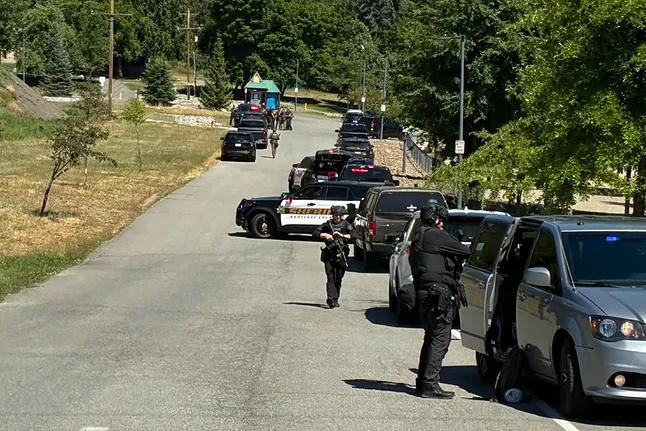 Several police officers in the area where the incident occurred.