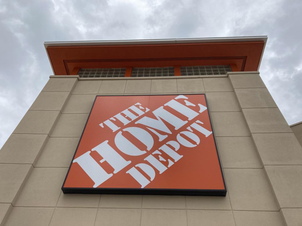 A Home Depot logo sign hands on its facade.