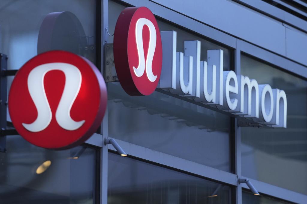 Lululemon signs are displayed outside a retail location in the Seaport District
