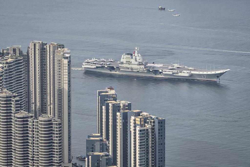 China's first domestically built aircraft carrier Shandong sails into Hong Kong