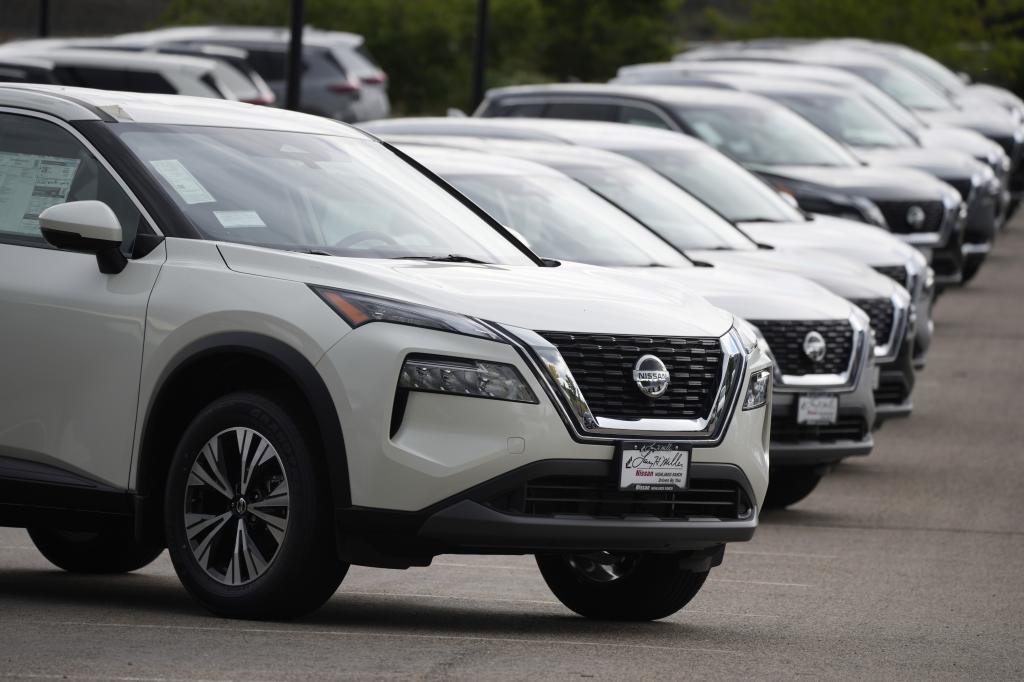 Unsold 2021 Rogue sports-utility vehicles sit on a lot at a Nissan dealership Colorado