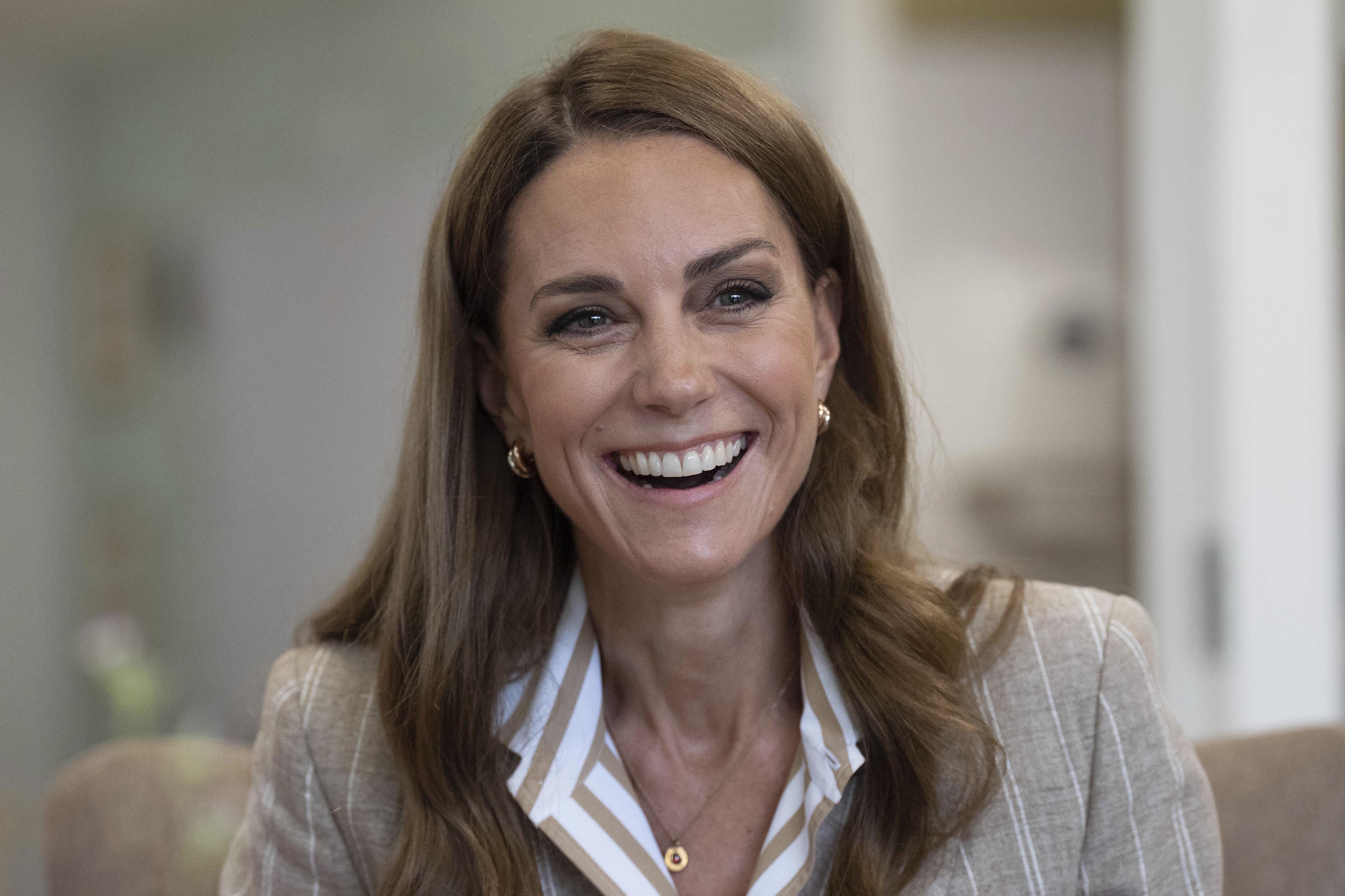 Princess of Wales, smiles during a visit to the RHS's Wellbeing Garden.