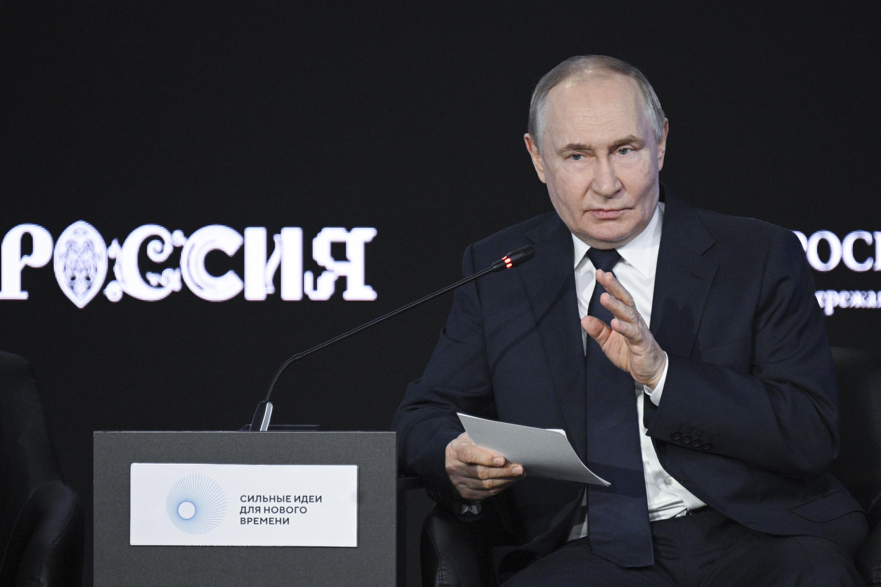 Putin speaks during a plenary session of the 5th annual forum Strong Ideas for a New Time.