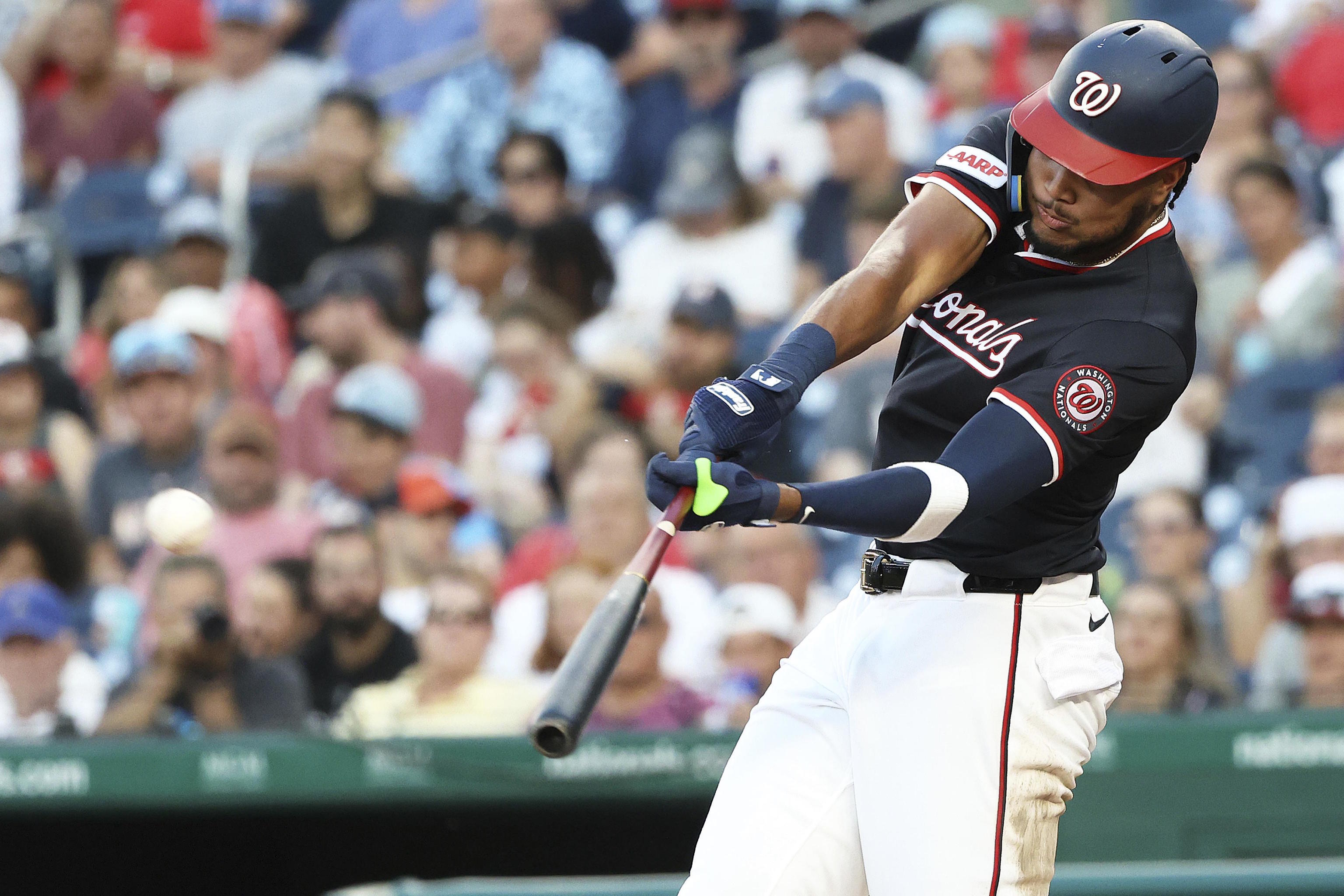 Washington Nationals' James Wood hits.
