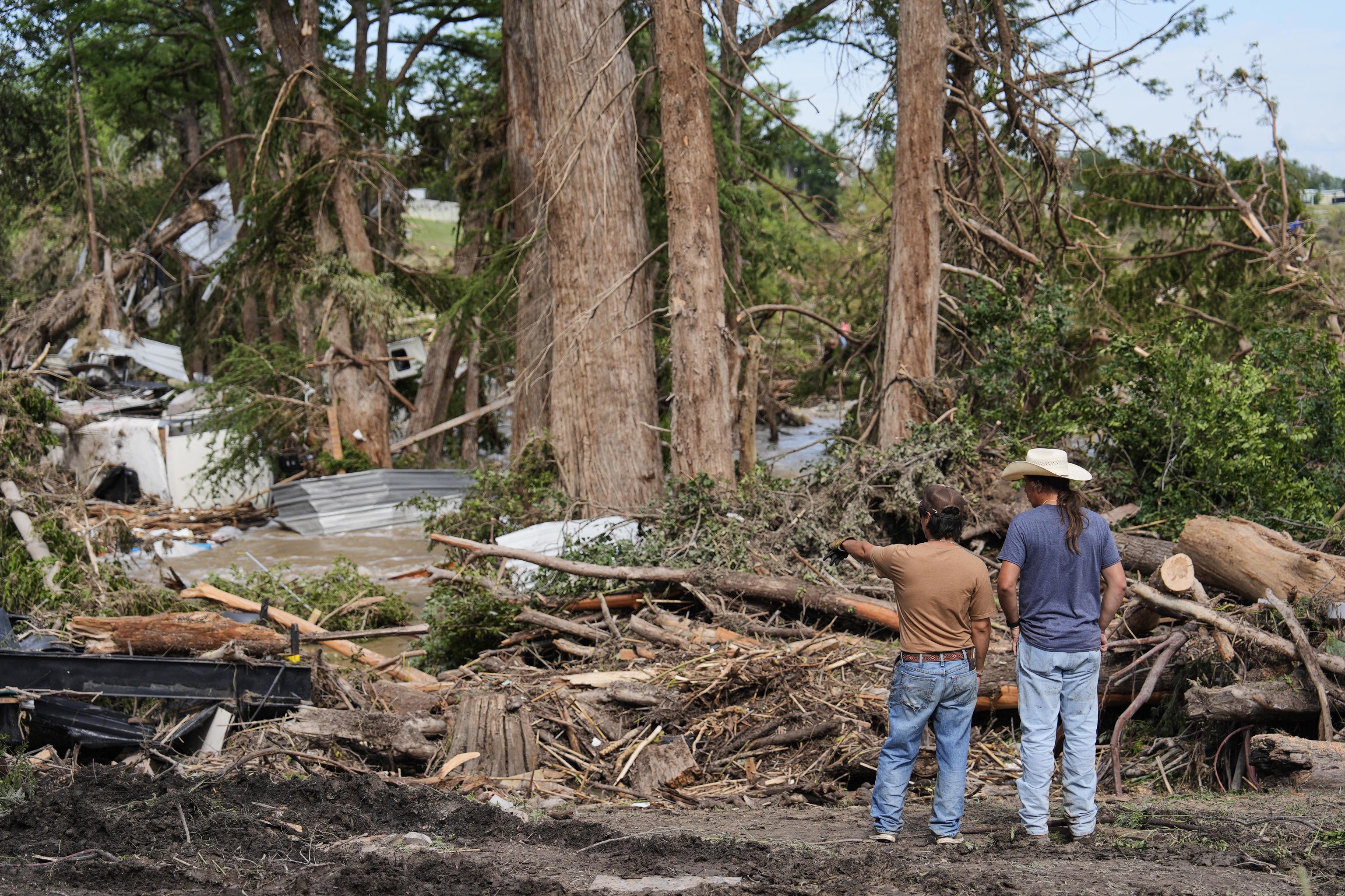 People survey the damage at Guadalupe Keys Resort.