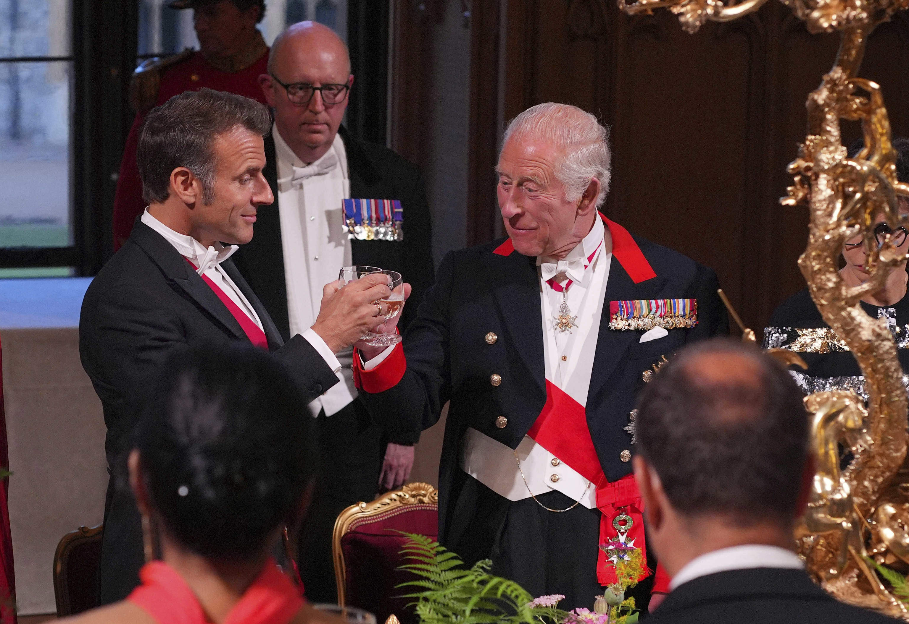 Britain's King Charles III, right, and President of France Emmanuel Macron, left.