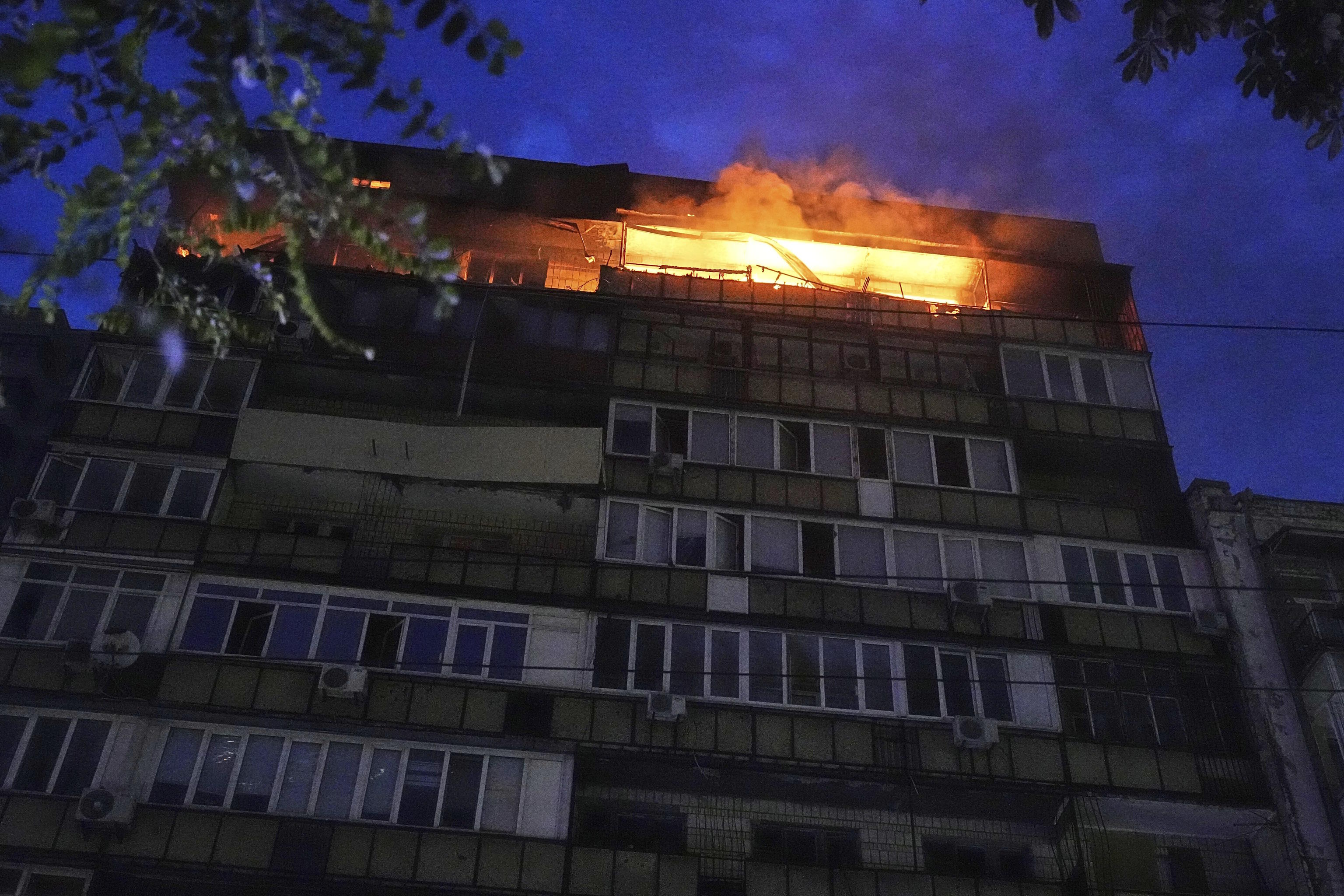 A fire breaks out in a residential building in Kyiv after a Russian attack.