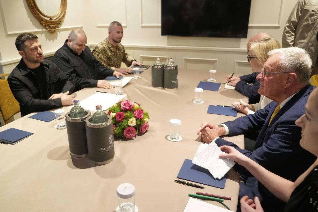 Volodymyr Zelenskyy, left, meets with United States Special Envoy.