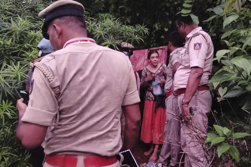 Indian policemen rescue Nina Kutina.