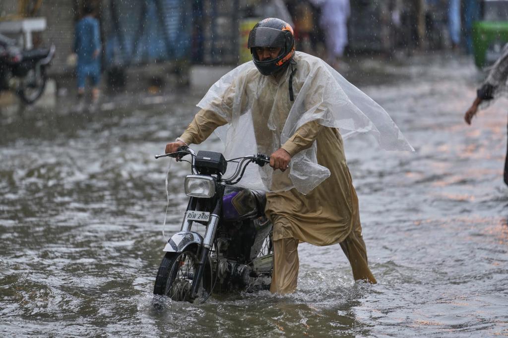 flooded road during monsoon rainfall in Pakistan.