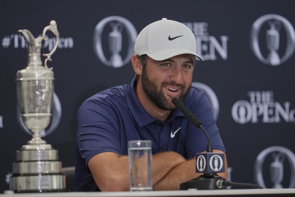 Scottie Scheffler of the United States speak at a press conference.