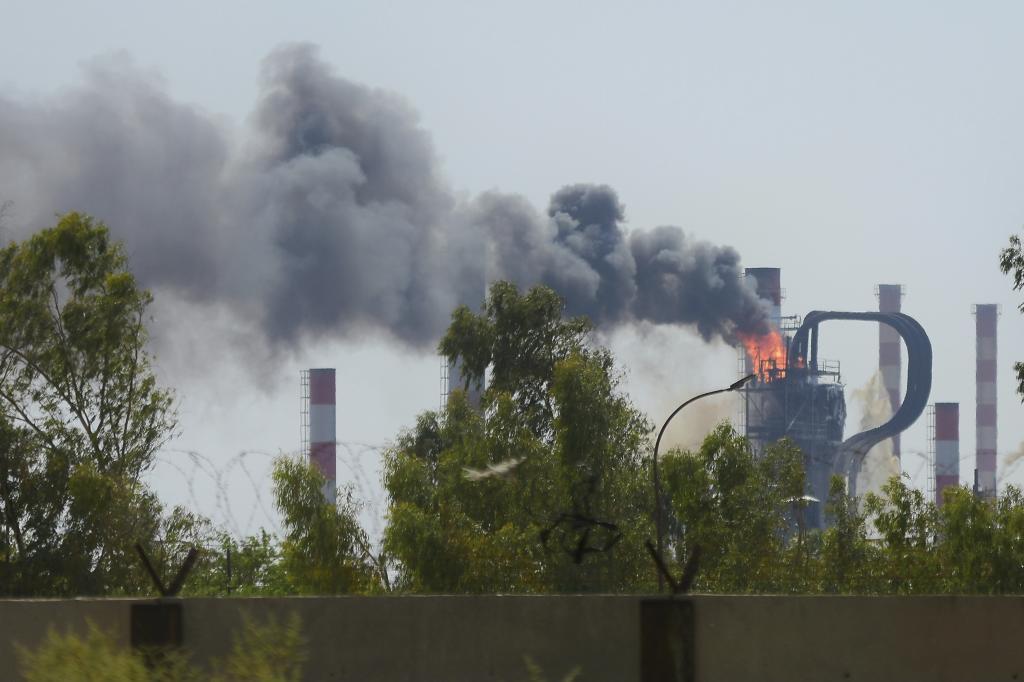 Smoke and flame in a unit of Abadan oil refinery in southwestern Iran.