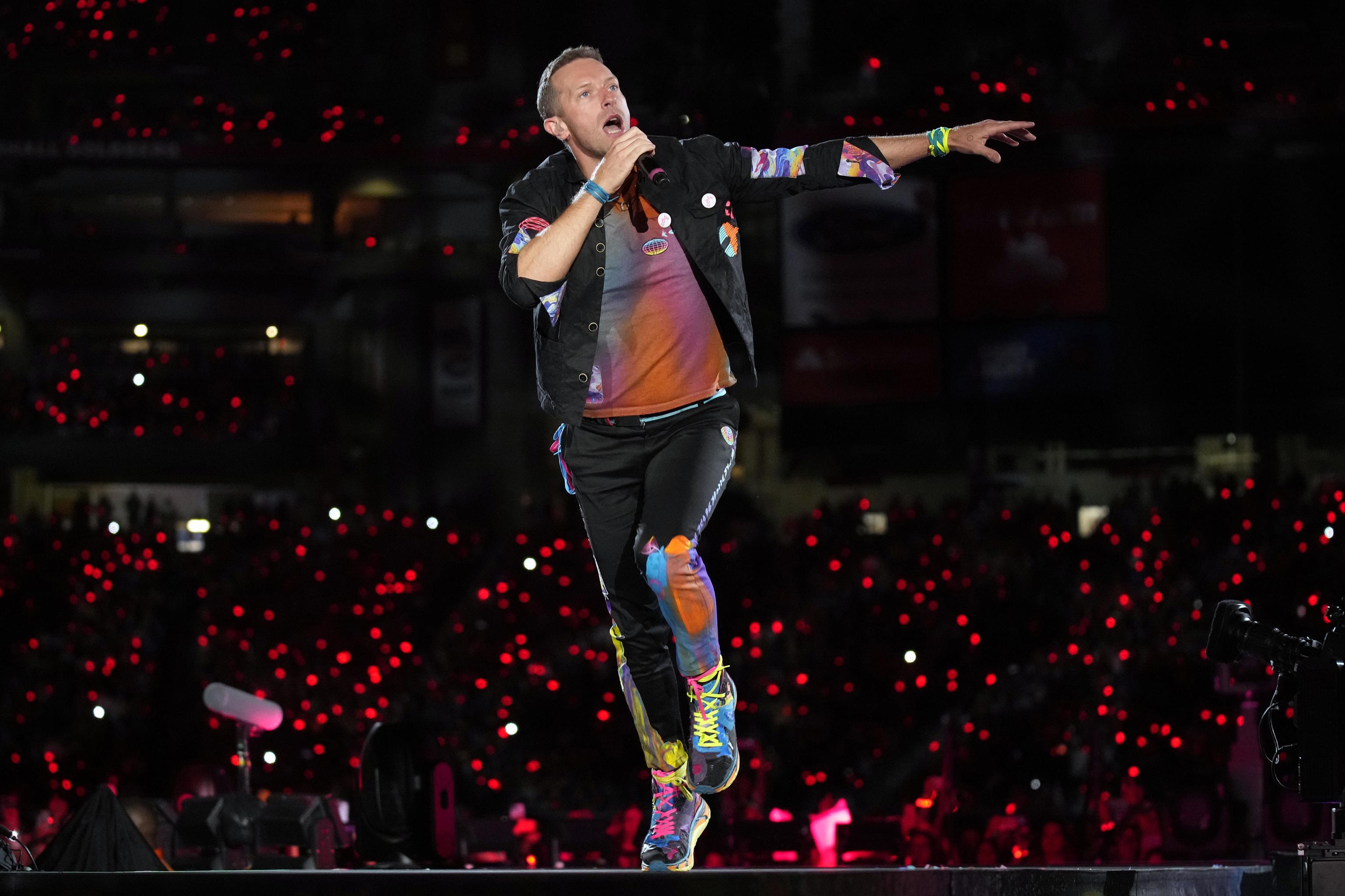 Chris Martin of Coldplay performs.