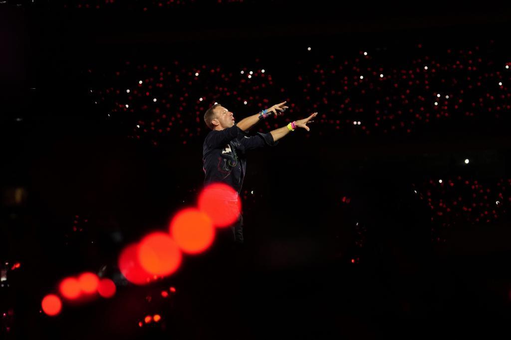 Chris Martin of Coldplay performs.