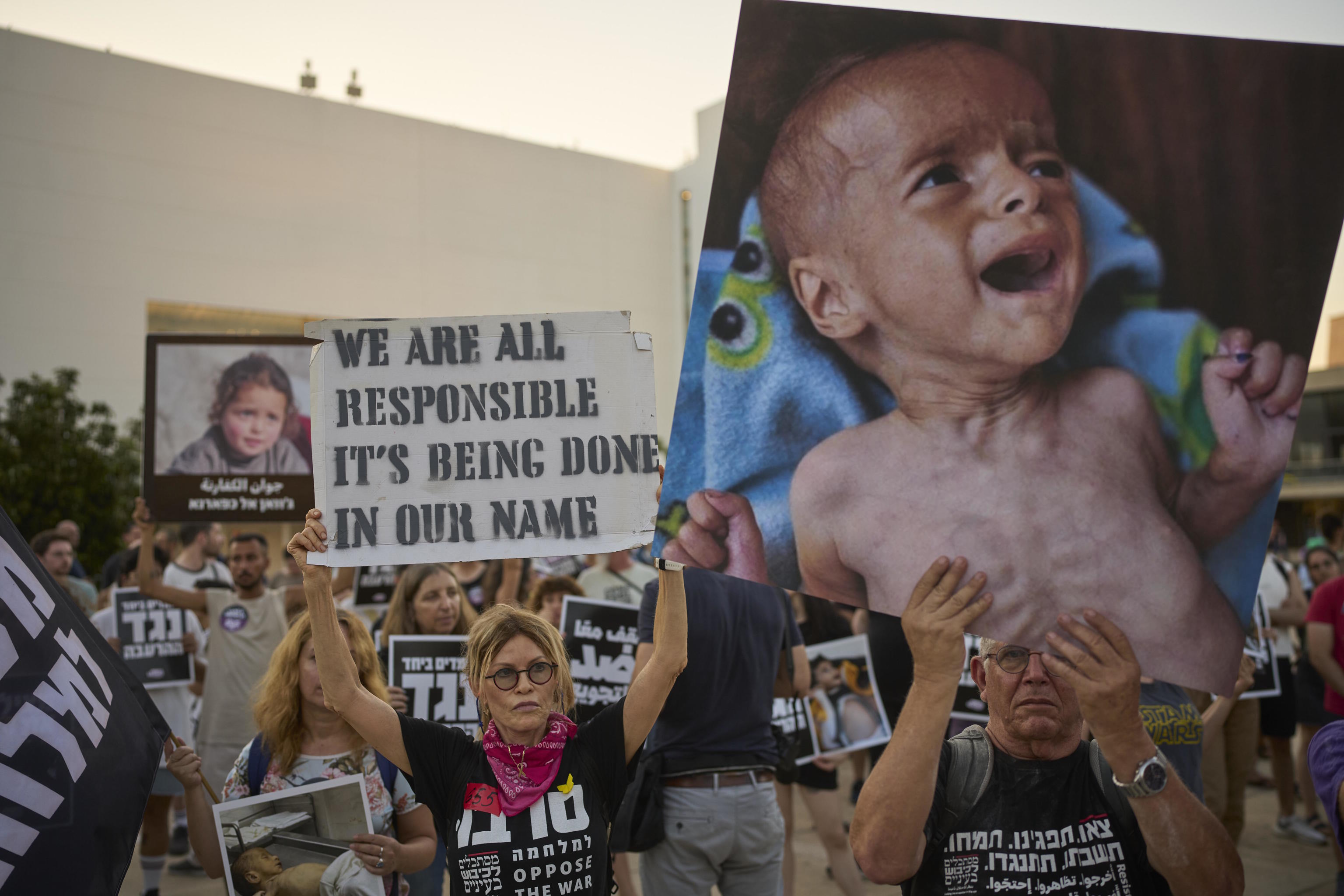 Israeli activists take part in a protest against the war in the Gaza Strip.