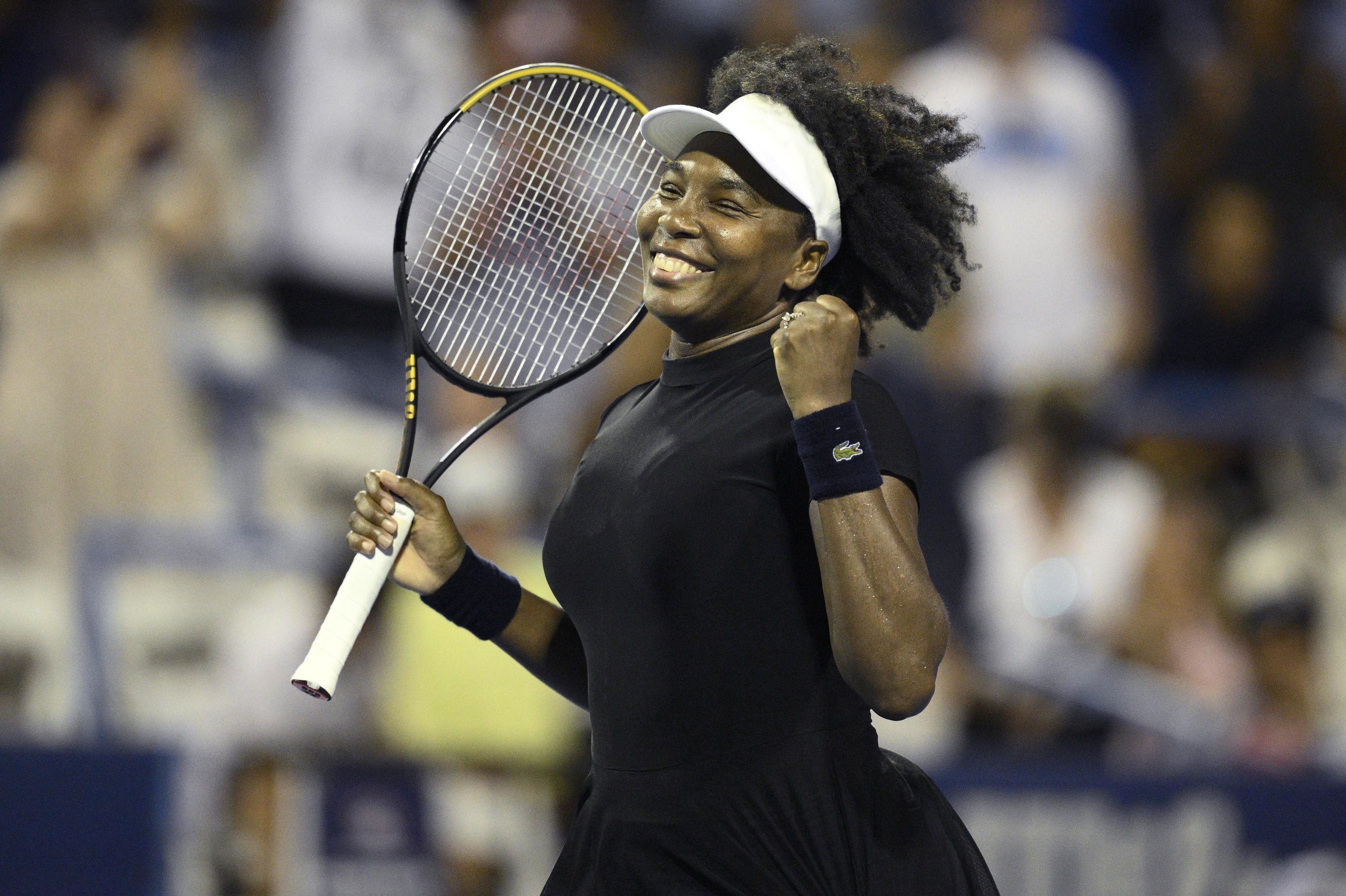 Venus Williams celebrates her win over Peyton Stearns.