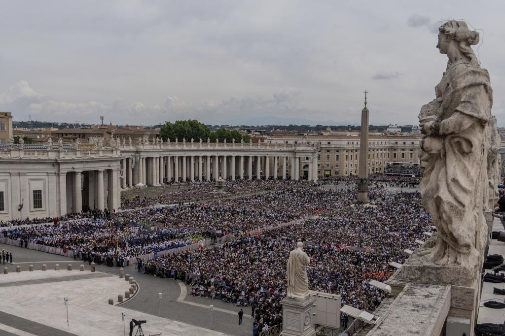 A crowd gathers in St. Peter's Square at the Vatican.