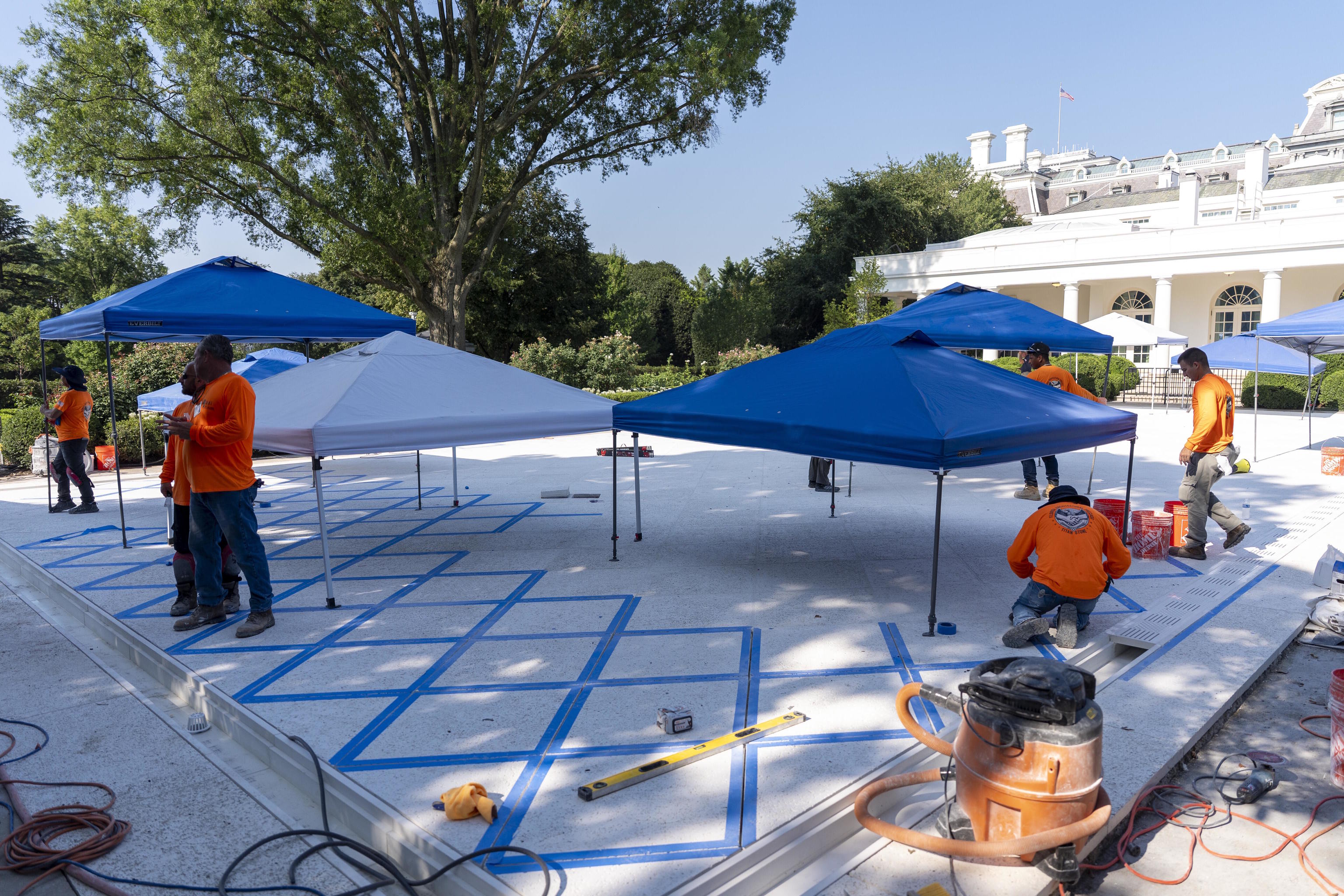Construction continues in the Rose Garden of the White House.