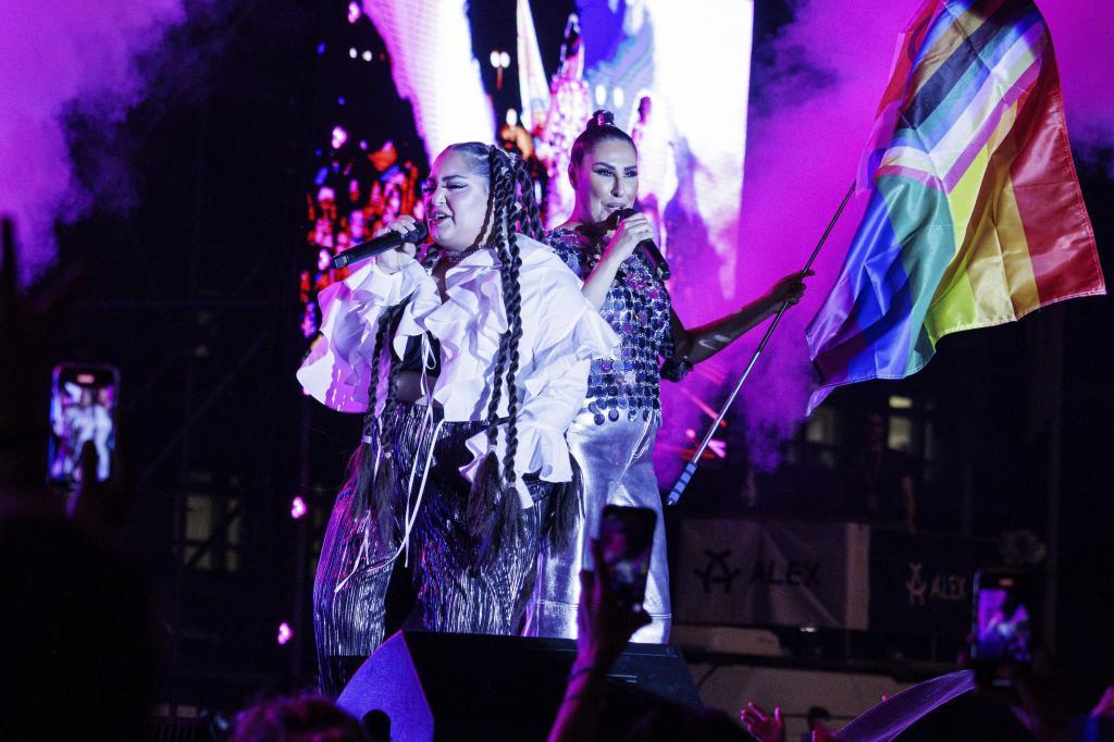 The group Monrose performs on stage.
