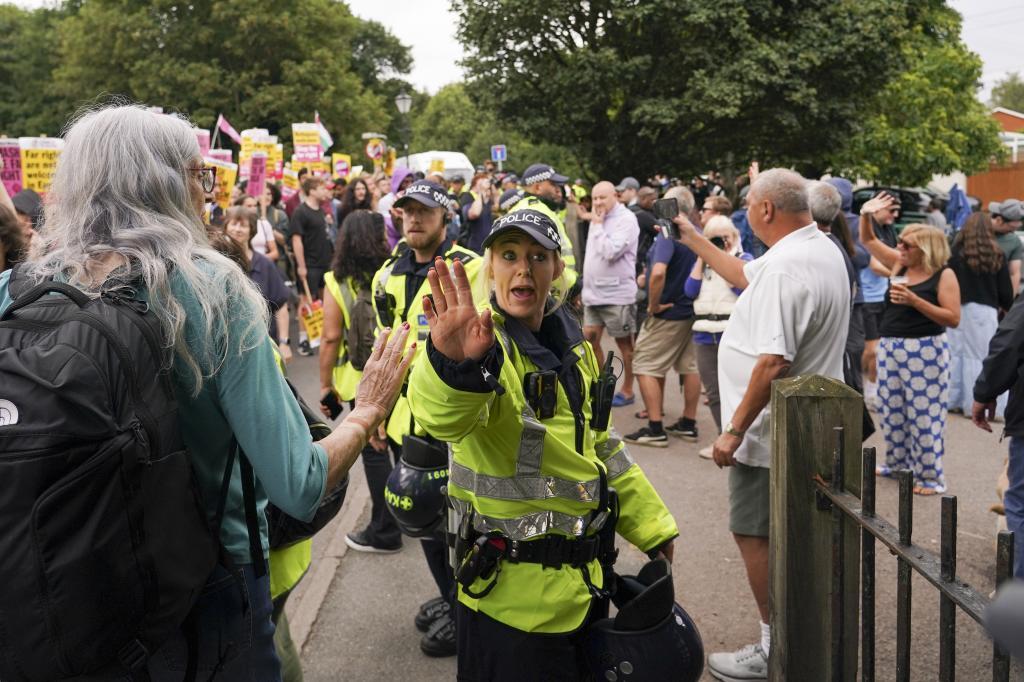 Protest outside the Bell Hotel in Epping, near London.