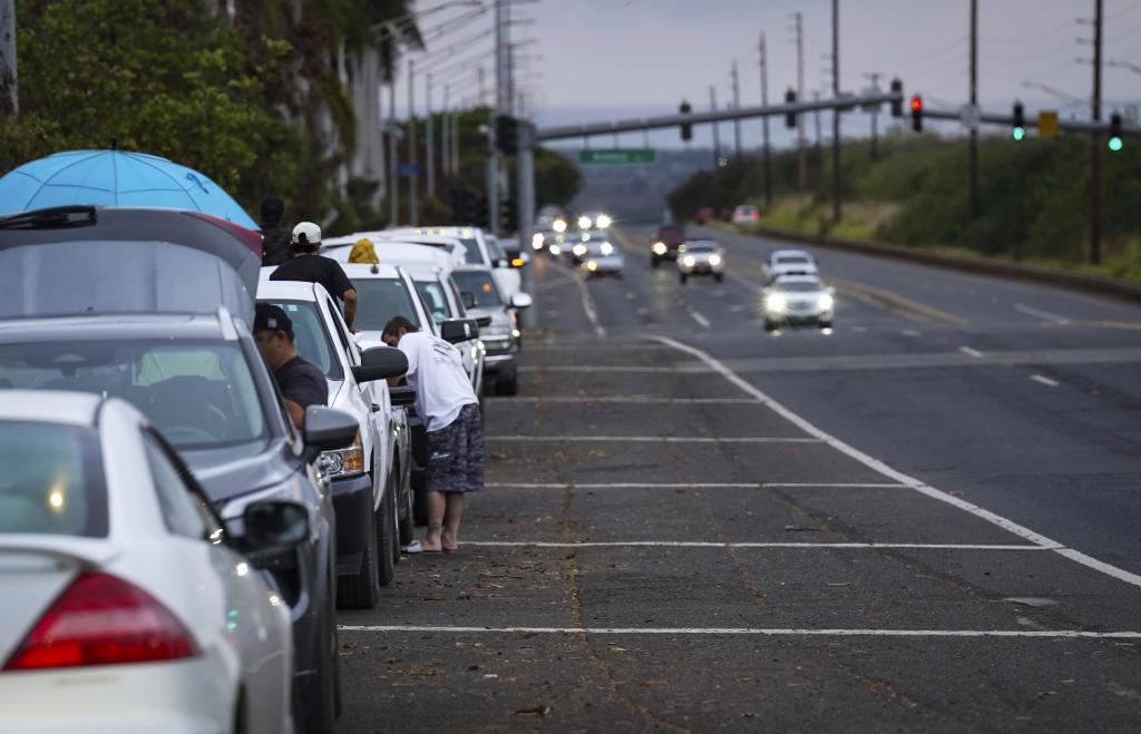 Oahu residents evacuate Ewa Beach.