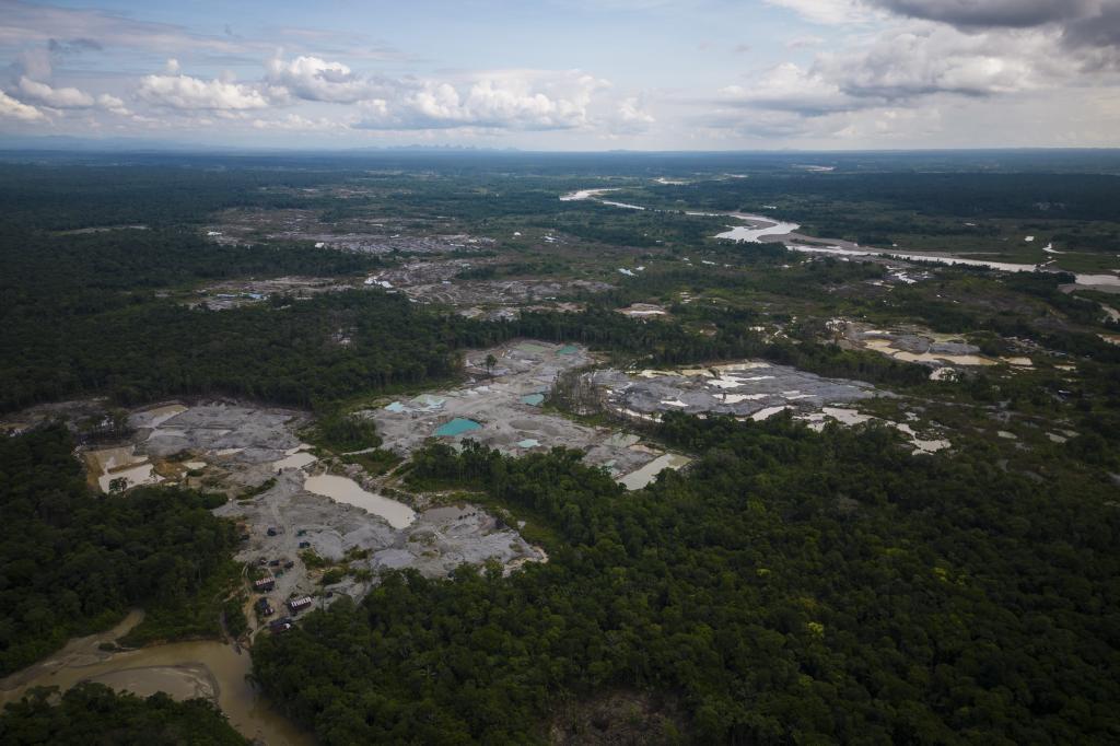Visible deforestation from illegal mining near Paimado, Colombia.