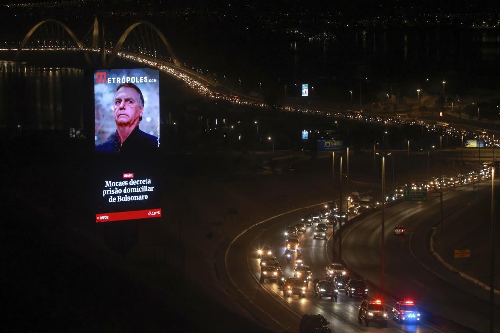 Supporters of former President Jair Bolsonaro protest in a car caravan