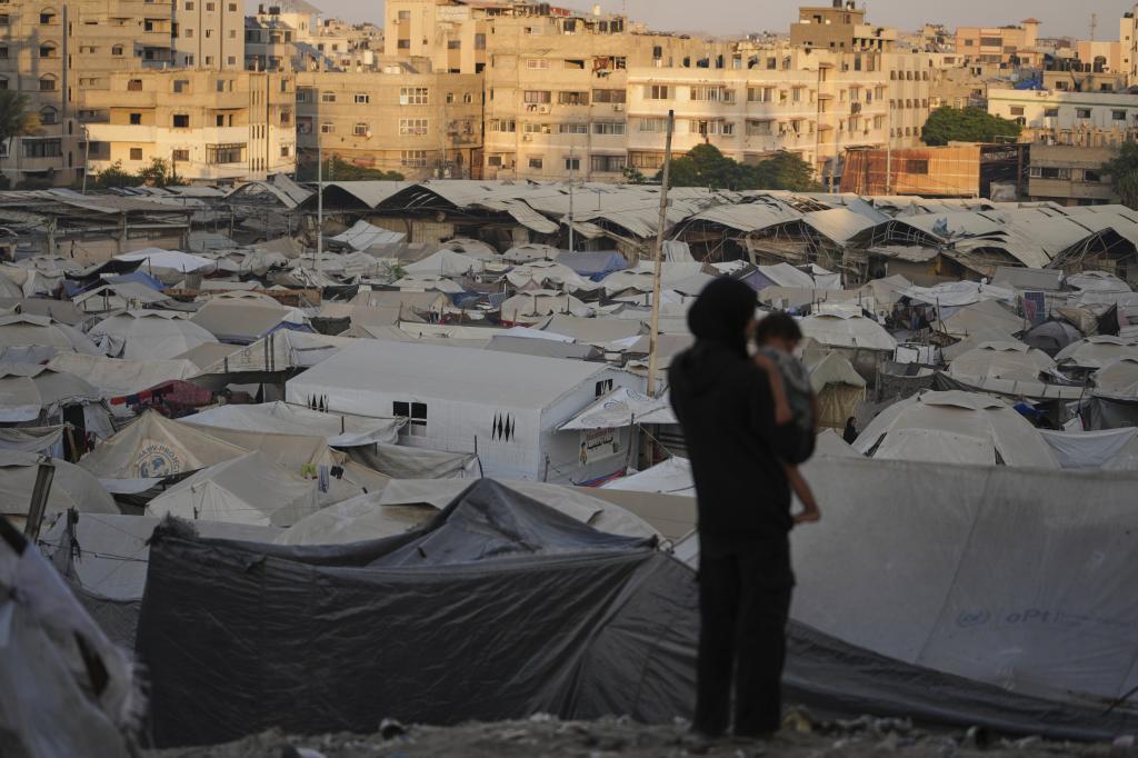 A tent camp for displaced Palestinians stretches along Gaza City