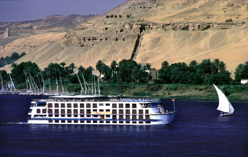 A yacht sails along the Nile River between Aswan and Luxor.