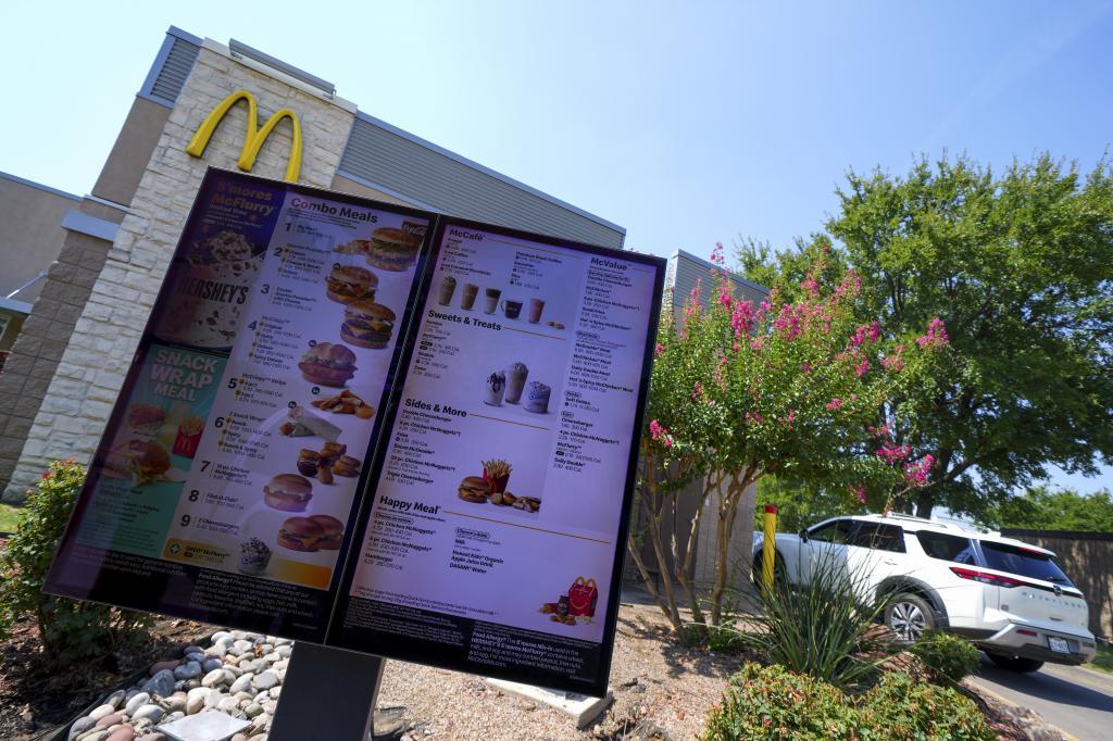 A video sign is seen in the drive-thru of a McDonald's