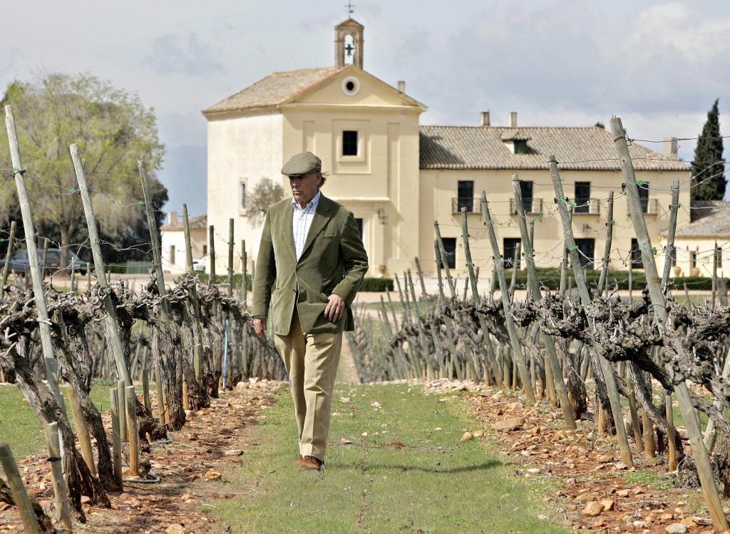 The Marquis of Grinon, Carlos Falco, walks between his vines at his 700-hectare (1,700-acre) estate in Malpica del Tajo, in the heart of Spain's central La Mancha region