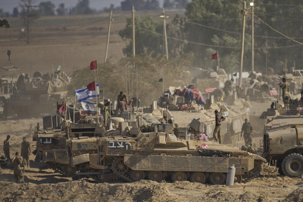 Israeli soldiers are seen near the Gaza Strip border in southern Israel
