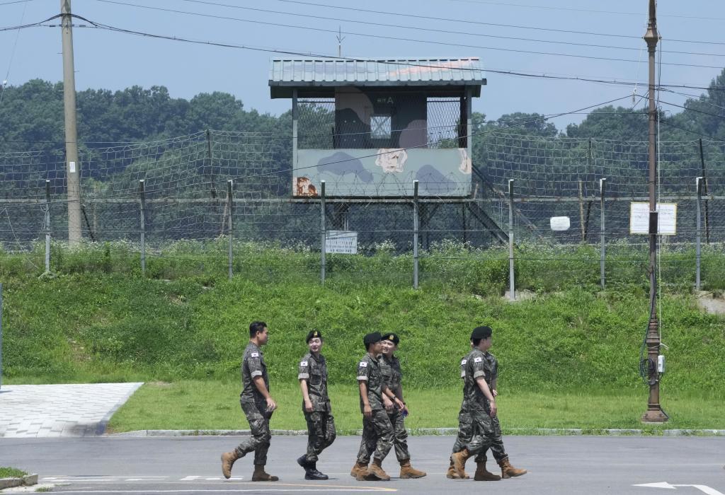 South Korean army soldiers pass by a military guard post at the Imjingak Pavilion in Paju, South Korea, near the border with North Korea
