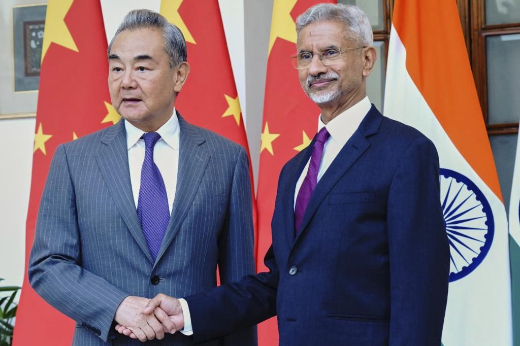 Indian Foreign Minister S. Jaishankar shakes hand with his Chinese counterpart Wang Yi