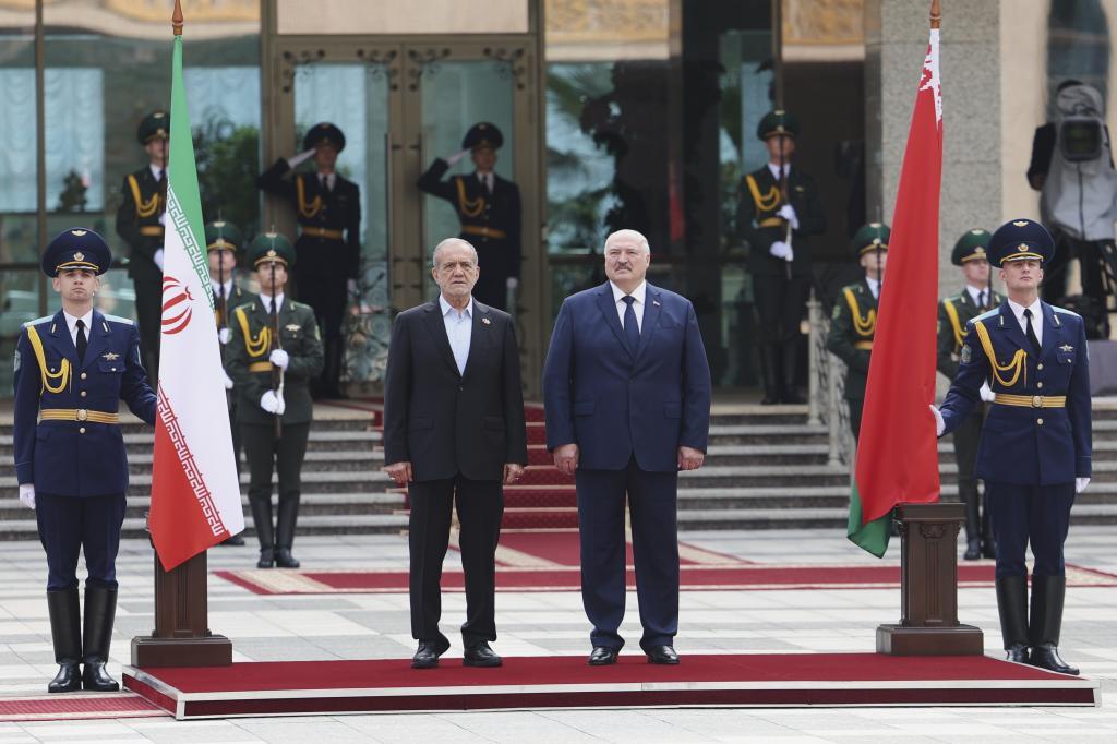 Belarusian President Alexander Lukashenko, center right, and Iranian President Masoud Pezeshkian, center left
