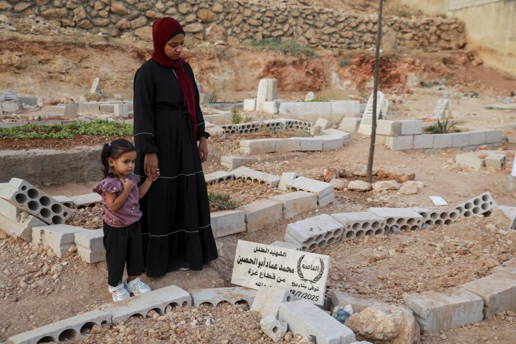 Amani Sleiman (29 years old), the mother of Muhammad imad Abu Al-Hussein, a child who died of malnutrition