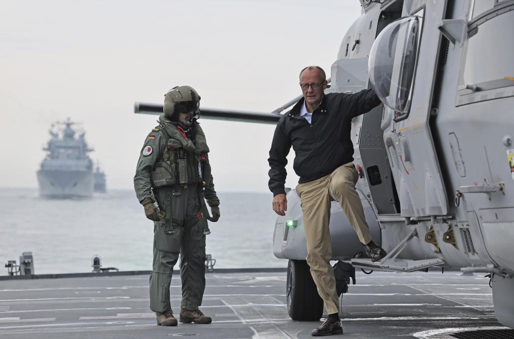 German Chancellor Friedrich Merz lands in a helicopter