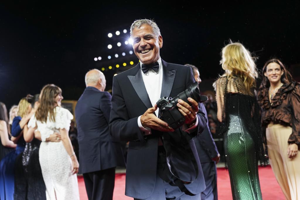 George Clooney poses for photographers at the red carpet for the film 'Jay Kelly'