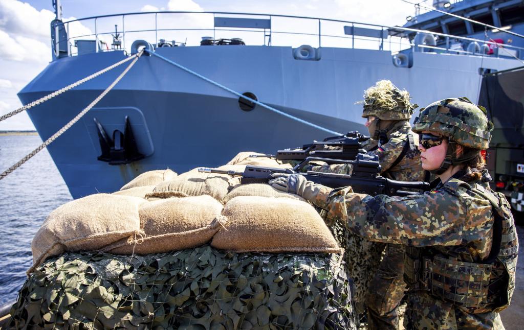 Soldiers of the German forces, Bundeswehr, secure the port at the start of Media Day as part of the 'Quadriga 2025' military maneuver in Rostock