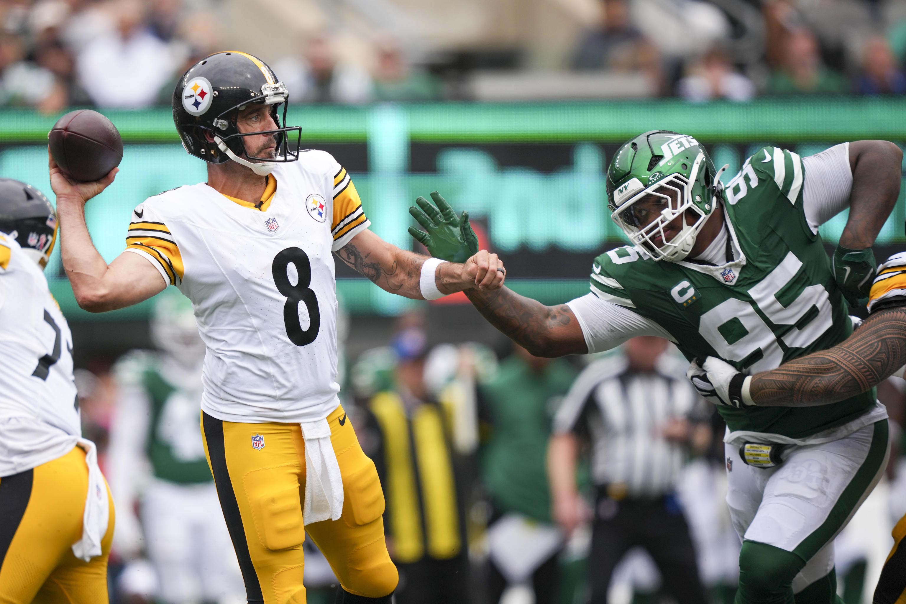 Pittsburgh Steelers quarterback Aaron Rodgers (8) throws a pass.