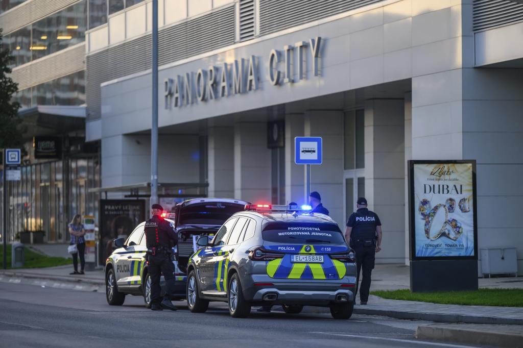 Police secure the evacuation of people from buildings due to the discovery of a World War II bomb