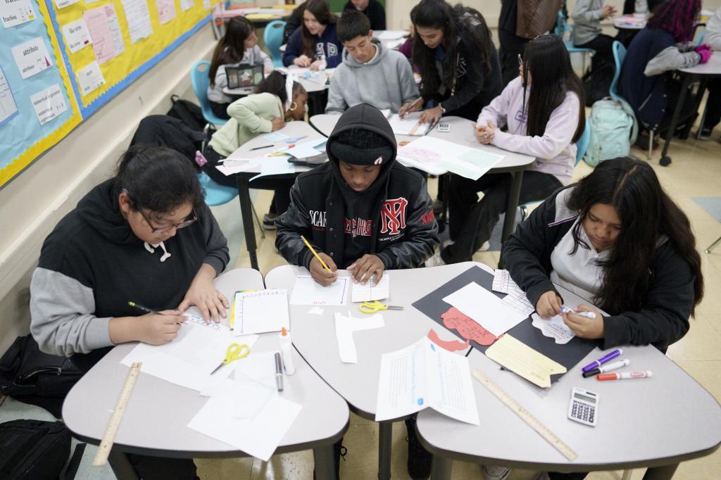 Students work in a classroom at Benjamin O. Davis Middle School in Compton