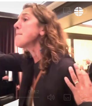 Protests against Trump at a restaurant.