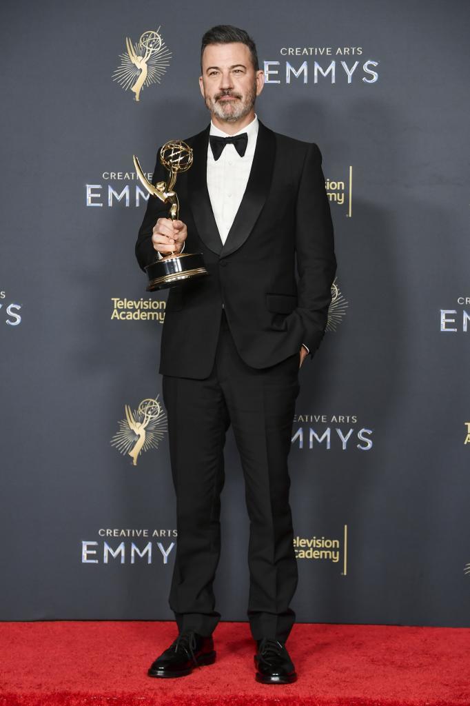 Jimmy Kimmel with Emmy for Outstanding Host for a Game Show "Who Wants To Be A Millionaire"
