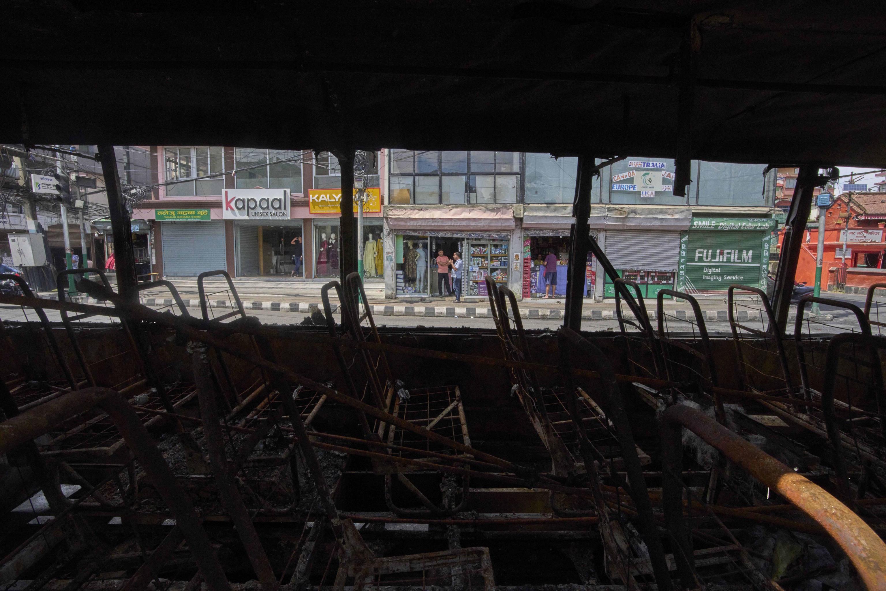 Bus burnt during anti-corruption protests in Kathmandu.