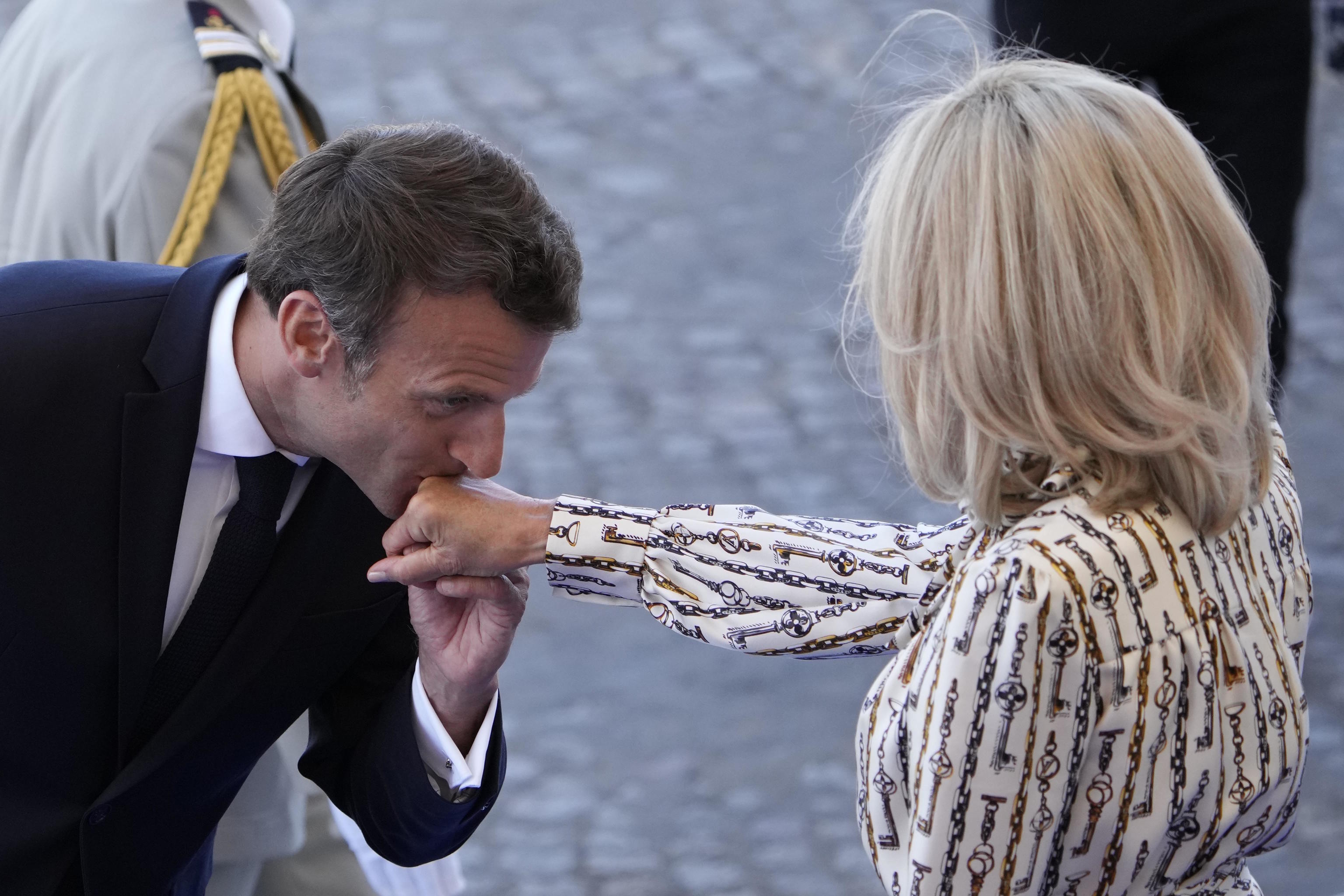 Macron and his wife Brigitte during an event.