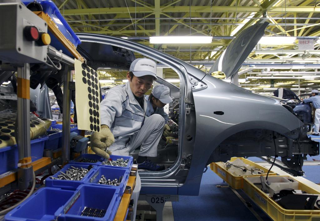 An assembly line worker at Toyota's central plant.